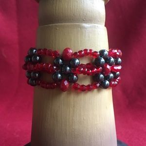 Red, adjustable, glass, and hematite bracelet